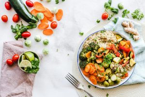 dinner plate filled with vegetables and rice